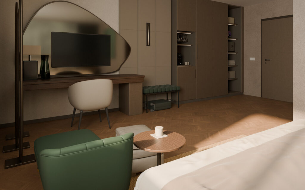 The same hotel room seen from the bed: a desk under a shaped mirror with a television, a slatted luggage bench with a suitcase and a full-height wardrobe with an open niche for glasses and a coffee machine.